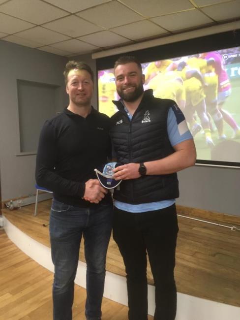 Alex Jenkins receives 300 games cap from Ian Gough